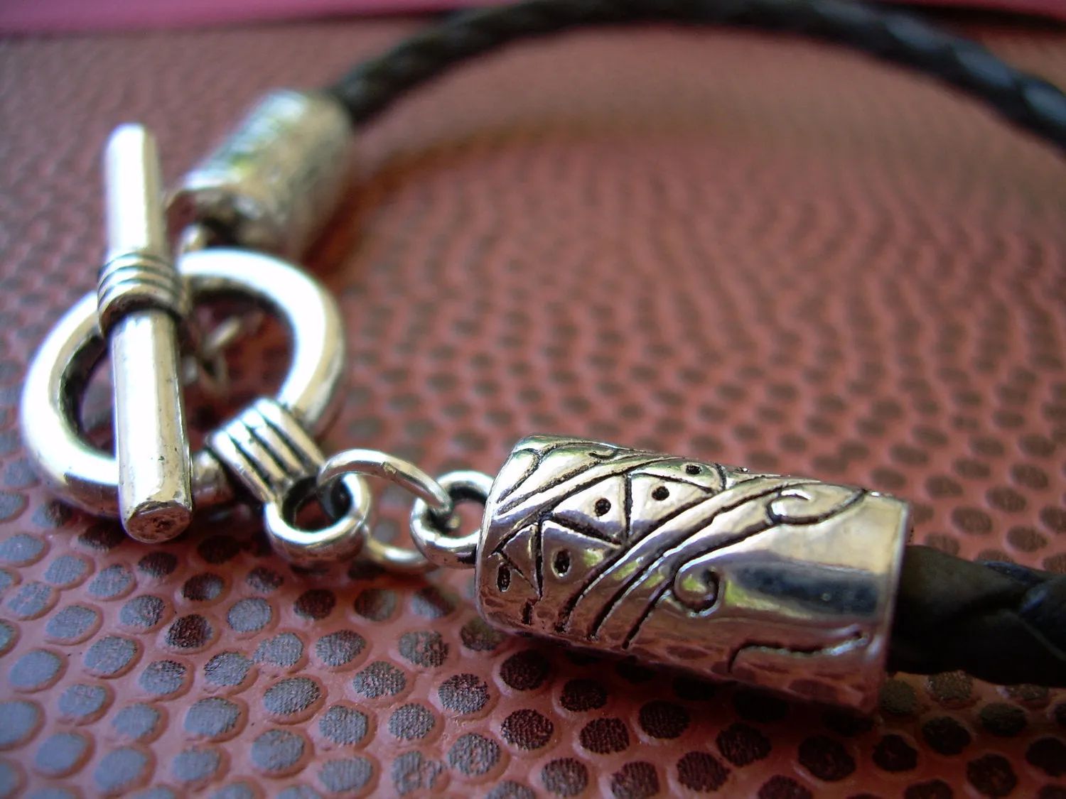 Black Braided Leather Bracelet with Patterned Toggle Clasp