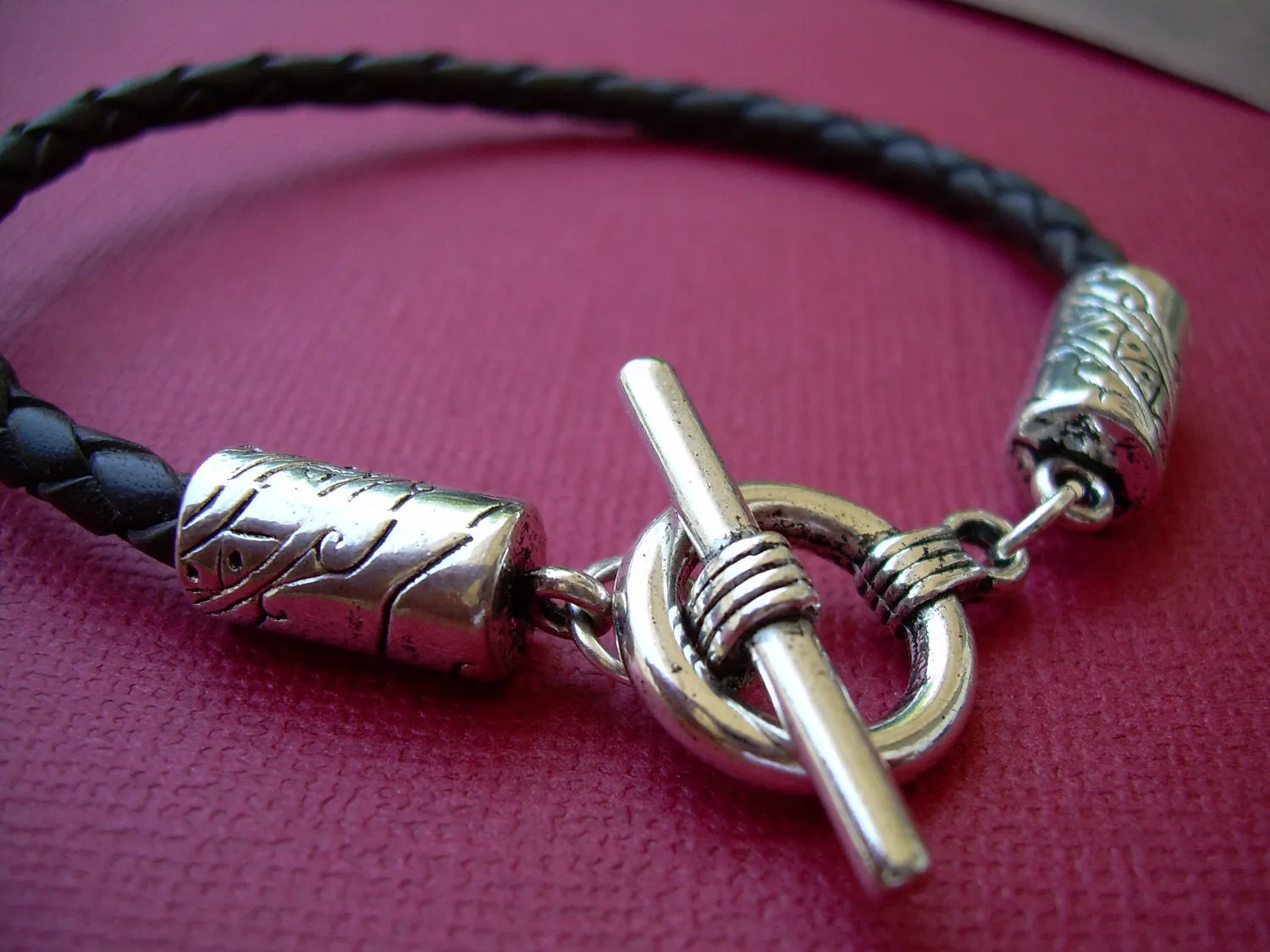 Black Braided Leather Bracelet with Patterned Toggle Clasp